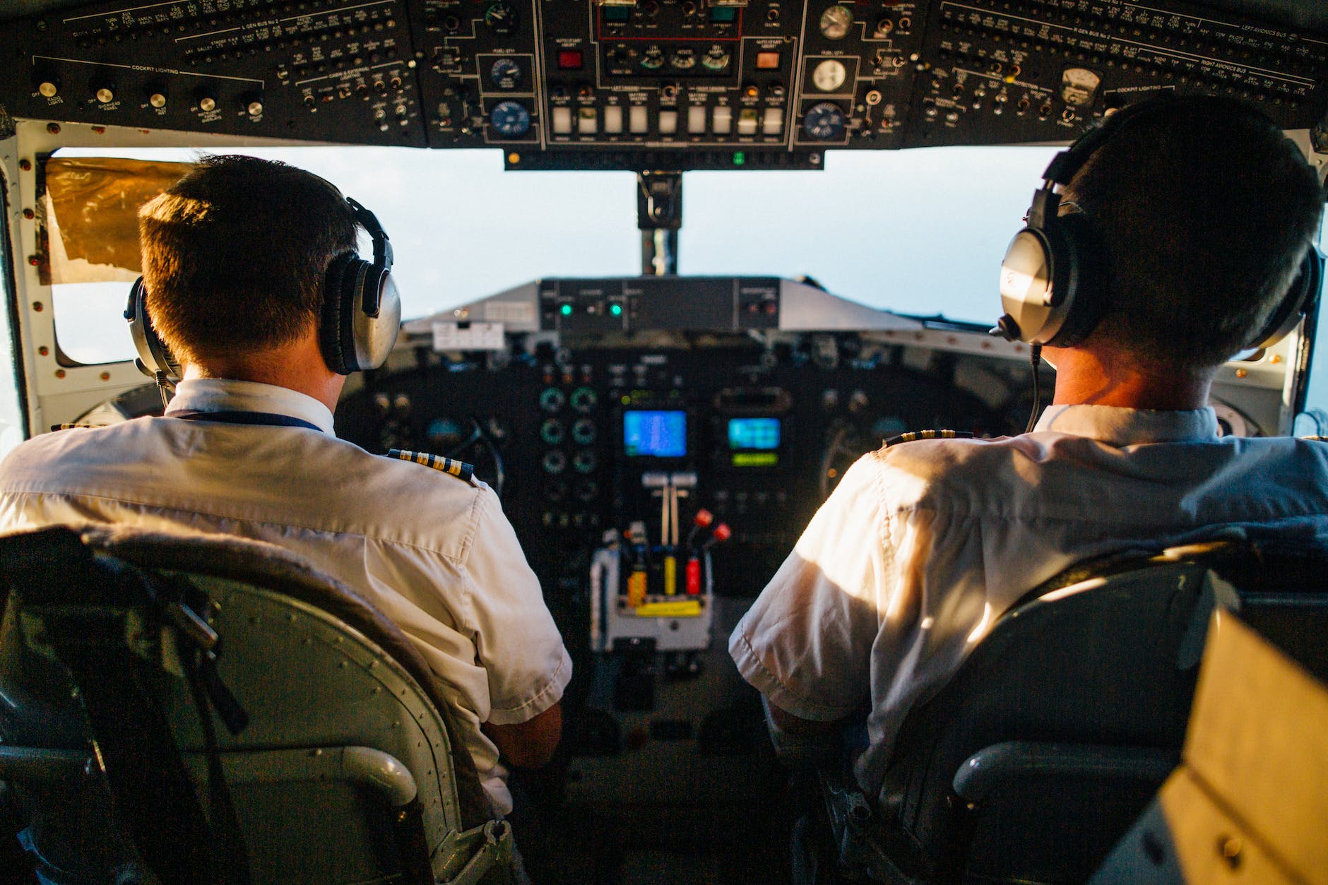 two pilots flying an airplane